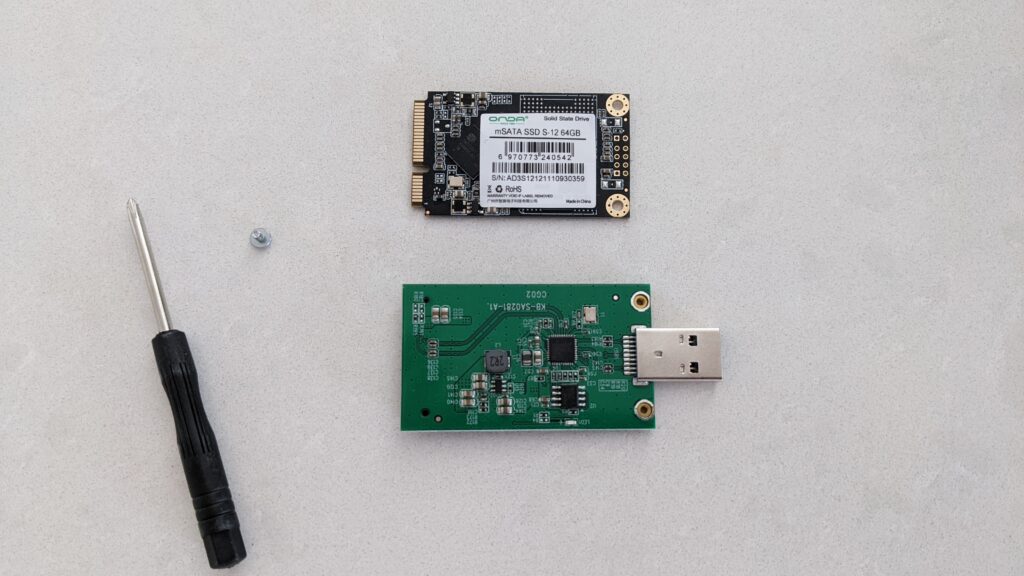 An mSATA SSD with an mSATA to USB adapter